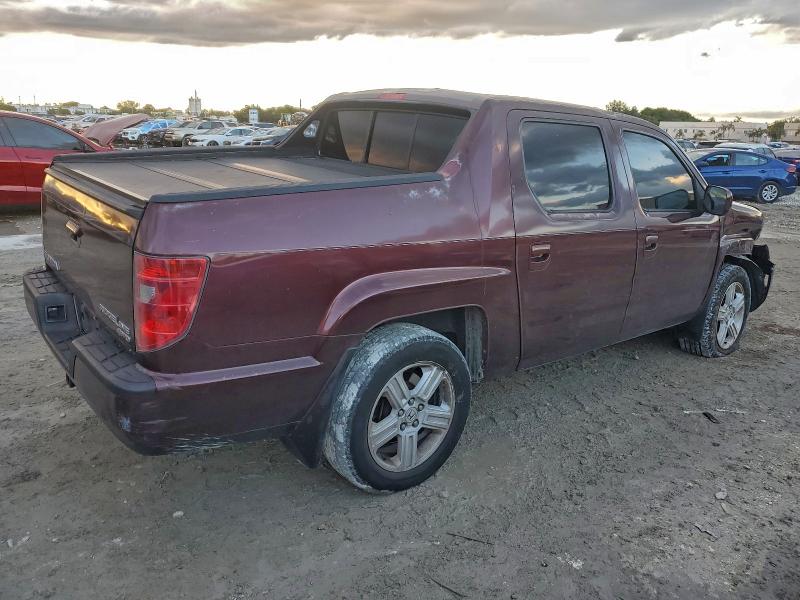 Photo 3 from auction – 2011 HONDA RIDGELINE with VIN 5FPYK1F50BB005796