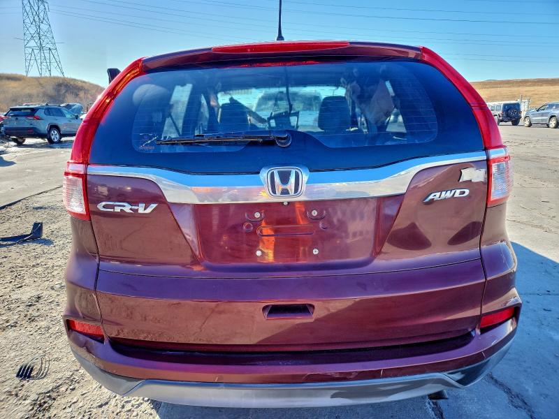 Photo 6 from auction – 2015 HONDA CR-V with VIN 2HKRM4H35FH629993