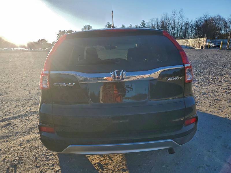Photo 6 from auction – 2015 HONDA CR-V EX with VIN 2HKRM4H51FH671966