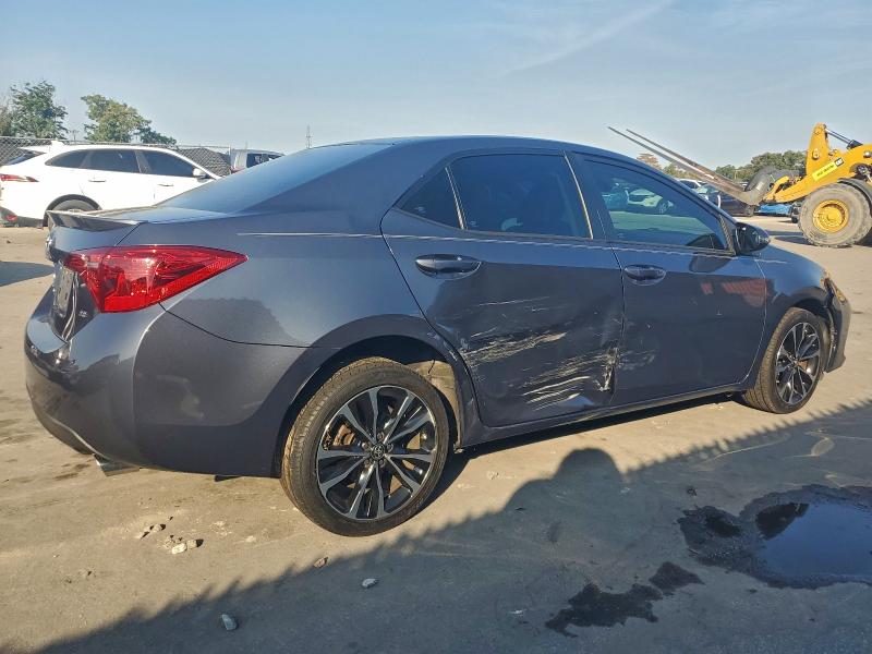 Photo 3 from auction – 2018 TOYOTA COROLLA L with VIN 5YFBURHE3JP799572