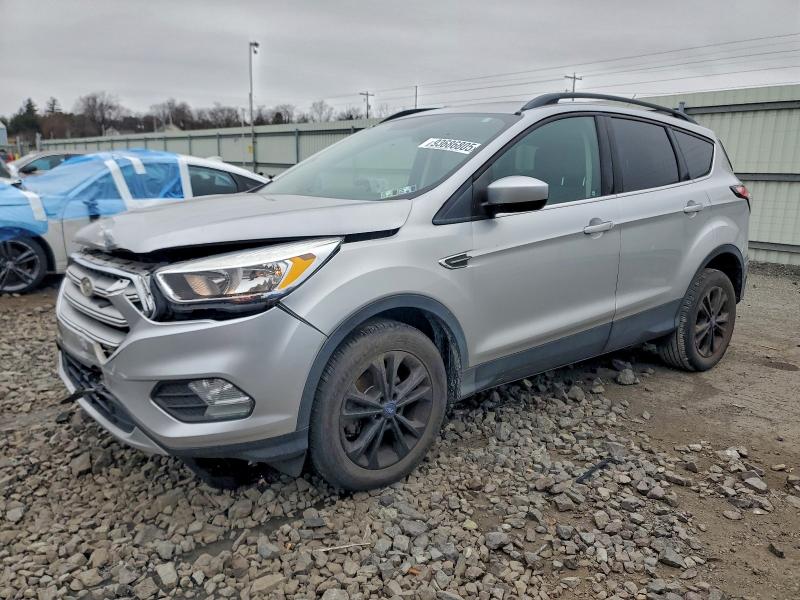 FORD ESCAPE SE 2018 with VIN 1FMCU0GD9JUD25522 - Photo from auction