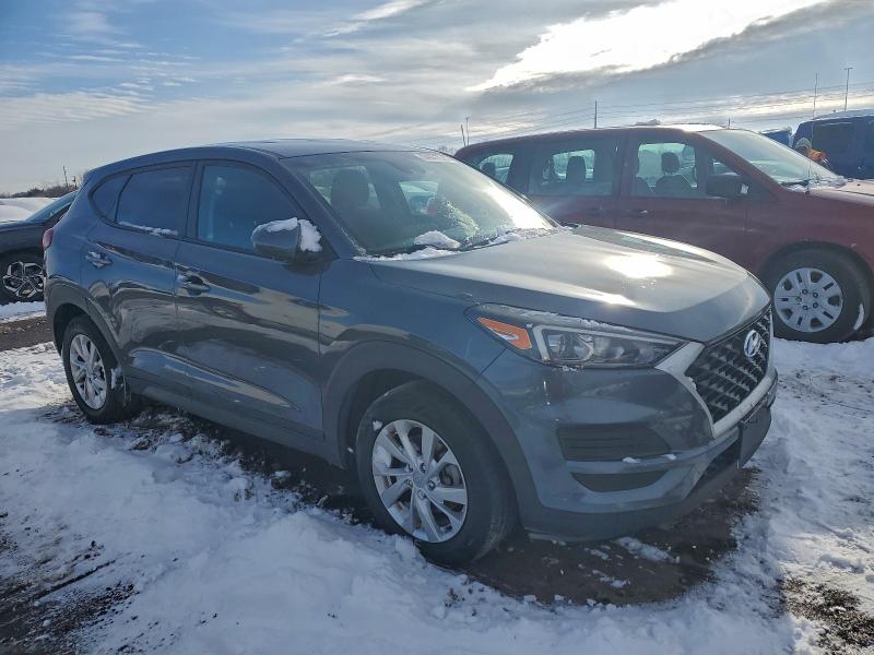 Photo 4 from auction – 2019 HYUNDAI TUCSON SE with VIN KM8J2CA48KU890868