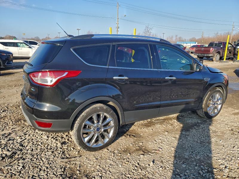 Photo 3 from auction – 2014 FORD ESCAPE SE with VIN 1FMCU9G98EUE50033