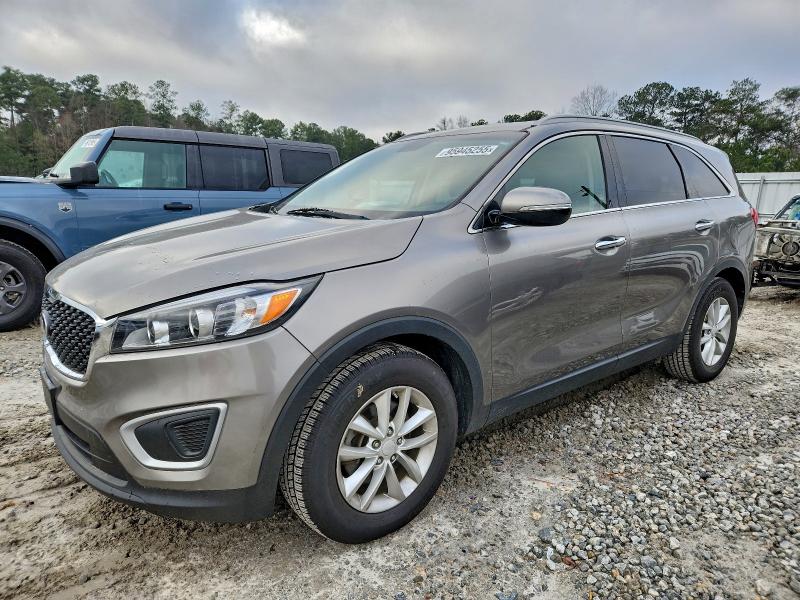 KIA SORENTO LX 2016 with VIN 5XYPG4A37GG004867 - Photo from auction