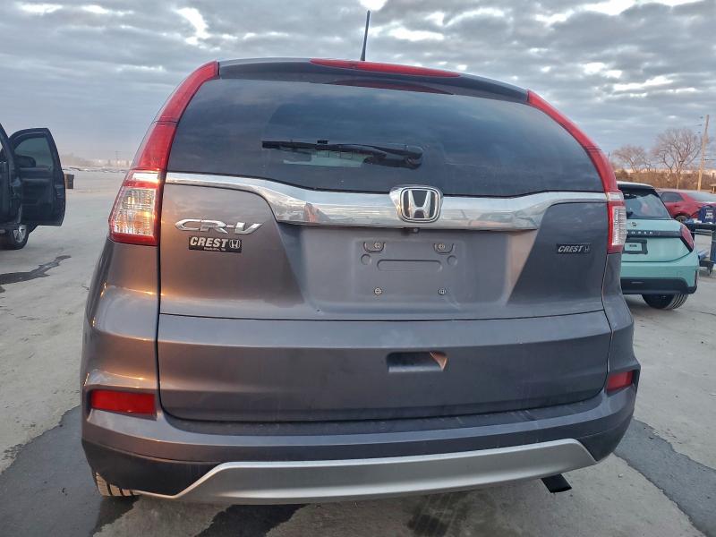 Photo 6 from auction – 2016 HONDA CR-V with VIN 2HKRM3H75GH520111