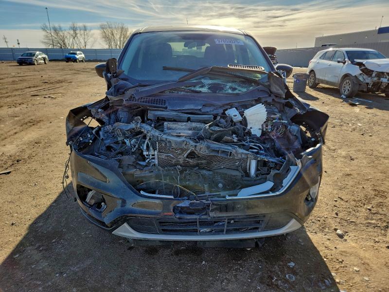 Photo 5 from auction – 2019 FORD ESCAPE with VIN 1FMCU0GD1KUA62797