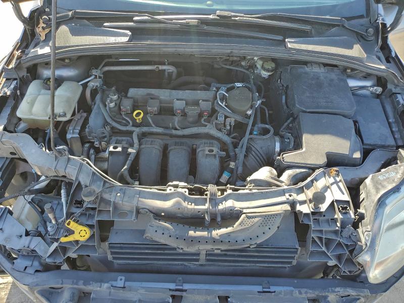Photo 11 from auction – 2014 FORD FOCUS SE with VIN 1FADP3F29EL130510