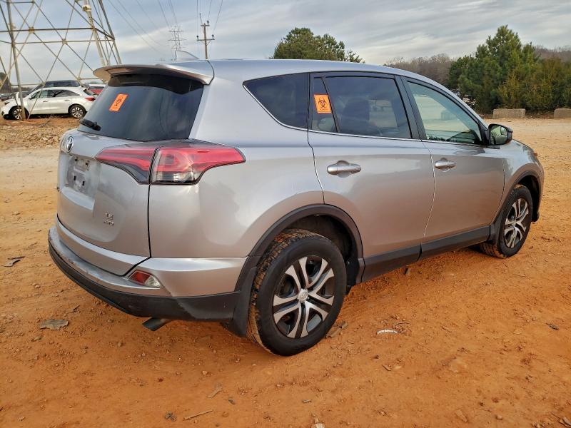 Photo 3 from auction – 2018 TOYOTA RAV4 LE with VIN JTMBFREVXJD252011