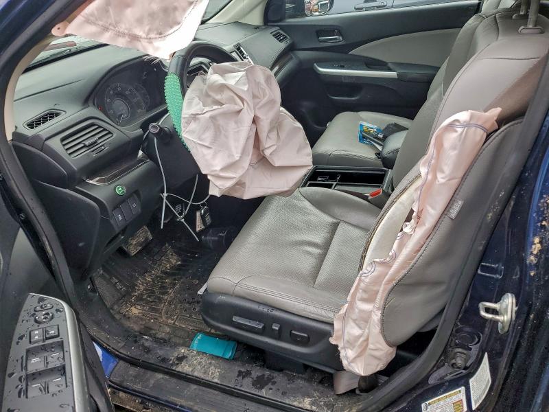 Photo 7 from auction – 2015 HONDA CR-V EXL with VIN 2HKRM3H77FH513577