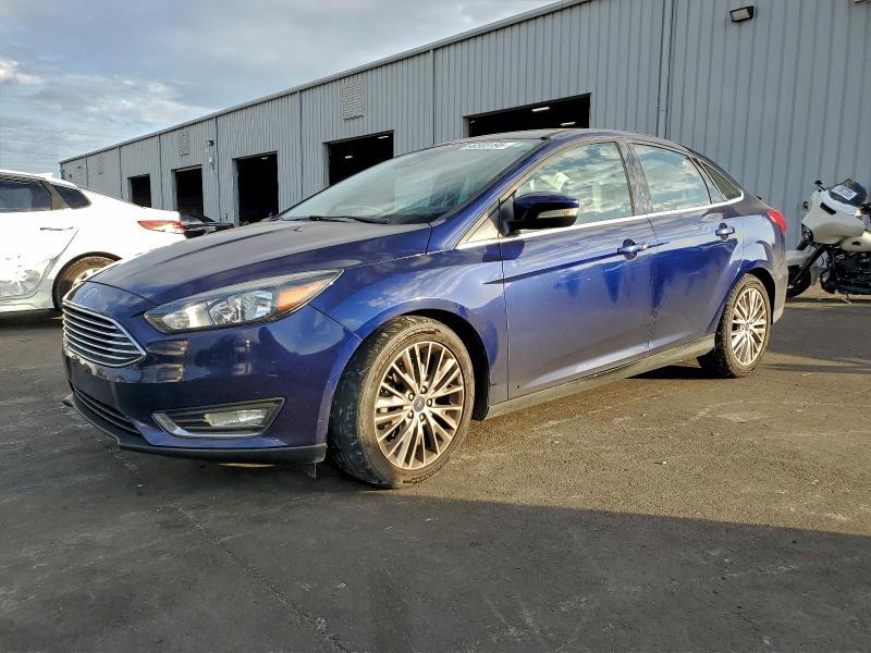 FORD FOCUS 2017 with VIN 1FADP3J20HL235075 - Photo from auction