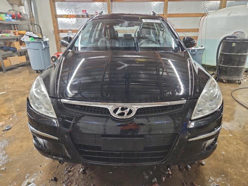 Photo 5 from auction – 2012 HYUNDAI ELANTRA TO with VIN KMHDC8AEXCU156685
