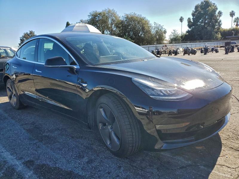 Photo 4 from auction – 2019 TESLA MODEL 3 with VIN 5YJ3E1EA4KF198771