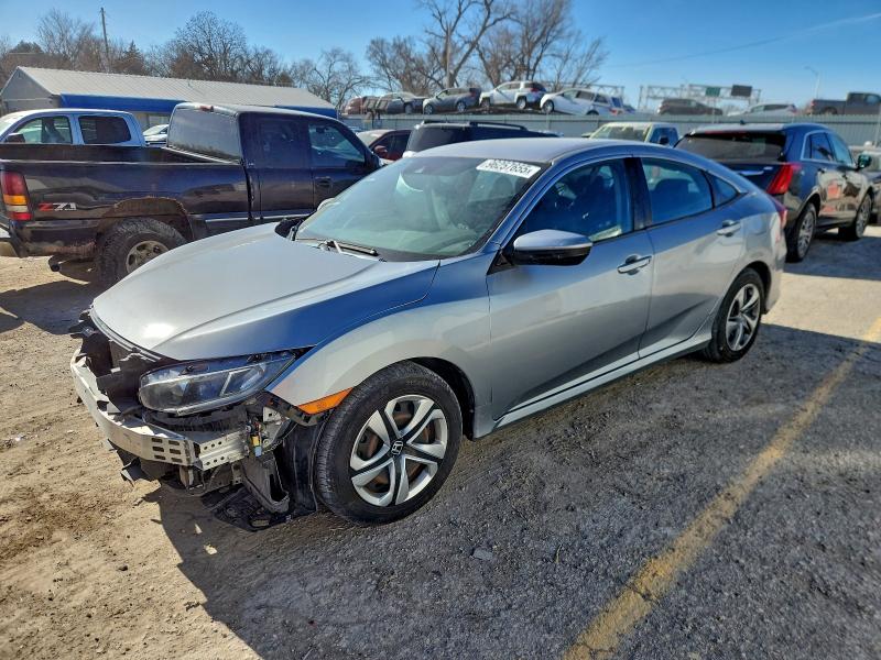 HONDA CIVIC LX 2019 with VIN 2HGFC2F65KH566096 - Photo from auction