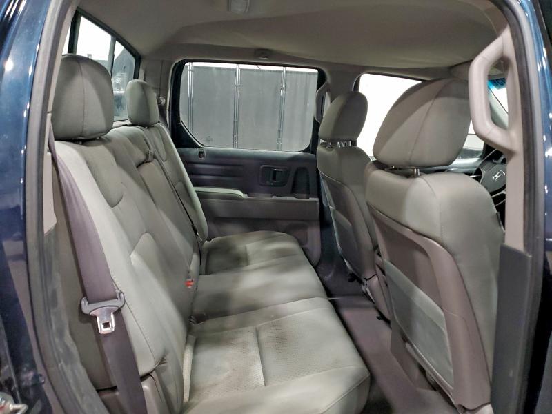 Photo 10 from auction – 2010 HONDA RIDGELINE with VIN 5FPYK1F20AB003289