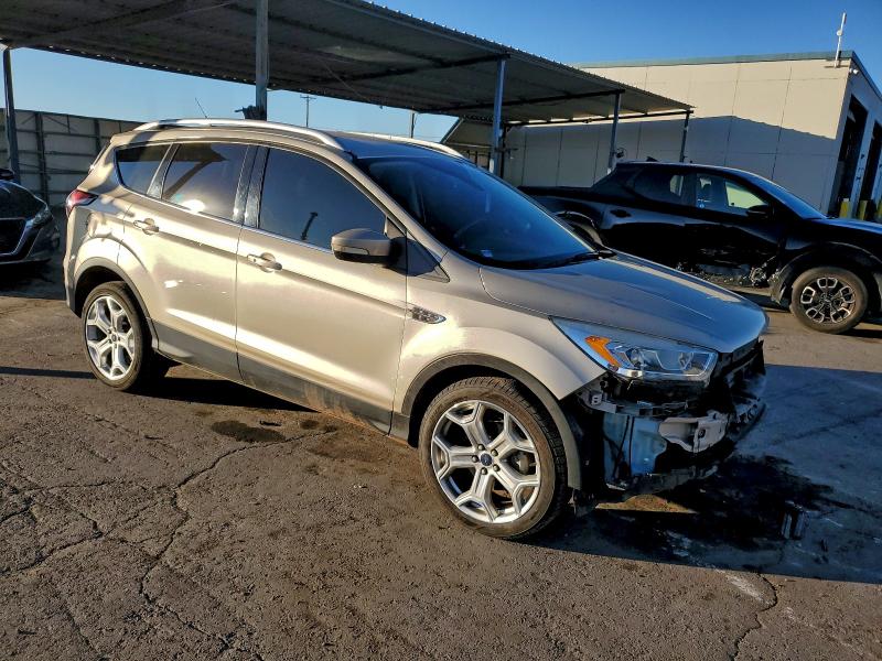 Photo 4 from auction – 2017 FORD ESCAPE TIT with VIN 1FMCU0JD7HUE36976