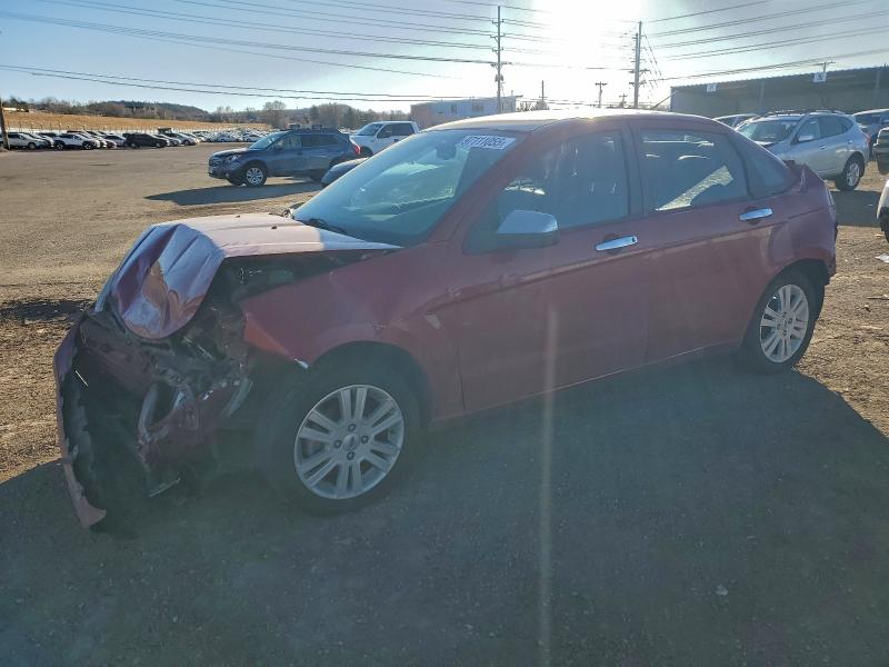 FORD FOCUS 2010 with VIN 1FAHP3HNXAW185839 - Photo from auction