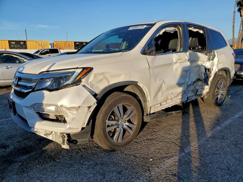 HONDA PILOT EXL 2017 with VIN 5FNYF6H57HB062786 - Photo from auction