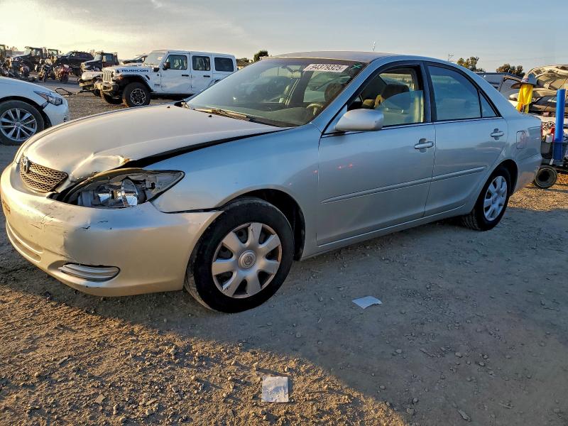 TOYOTA CAMRY LE 2003 with VIN JTDBE32K130228345 - Photo from auction