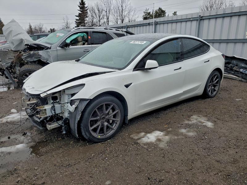 TESLA MODEL 3 2021 with VIN 5YJ3E1EA4MF915785 - Photo from auction