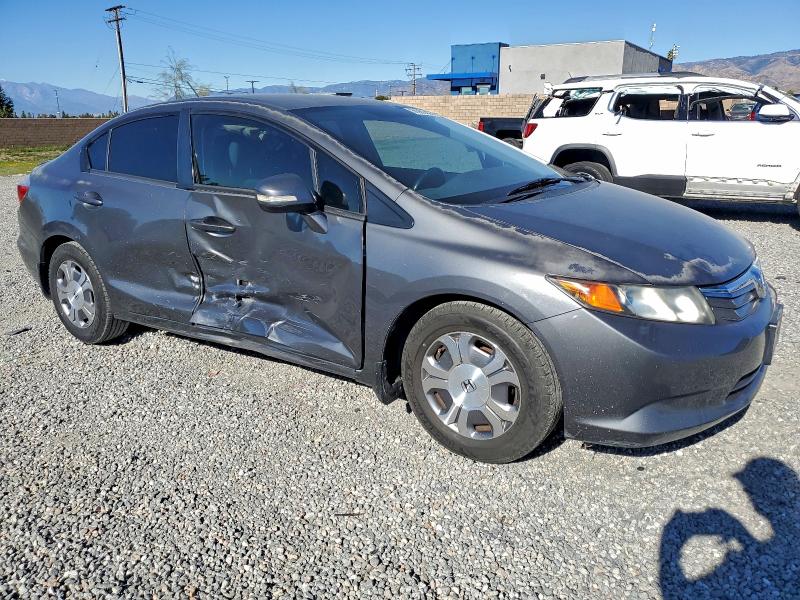 Photo 4 from auction – 2012 HONDA CIVIC HYBR with VIN JHMFB4F31CS001663