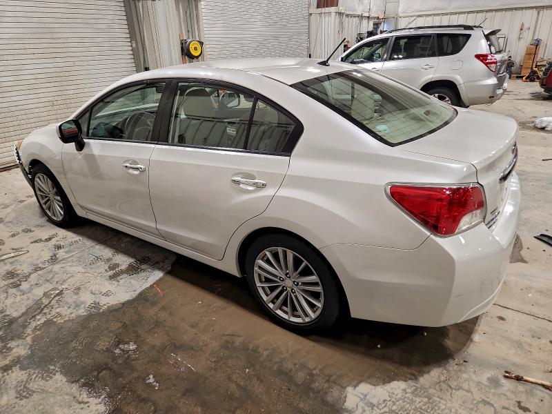 Foto 2 de la subasta – 2012 SUBARU IMPREZA LI con VIN JF1GJAG64CH007749