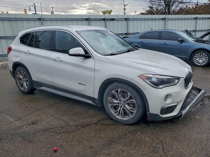 Photo 4 from auction – 2017 BMW X1 XDRIVE2 with VIN WBXHT3C30H5F81389