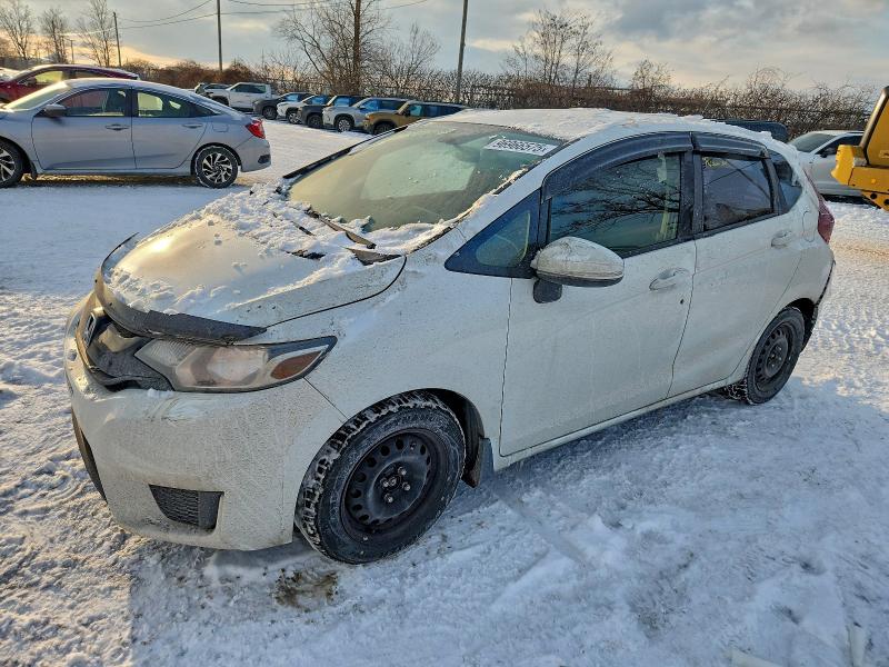HONDA FIT LX 2016 with VIN 3HGGK5H5XGM106910 - Photo from auction