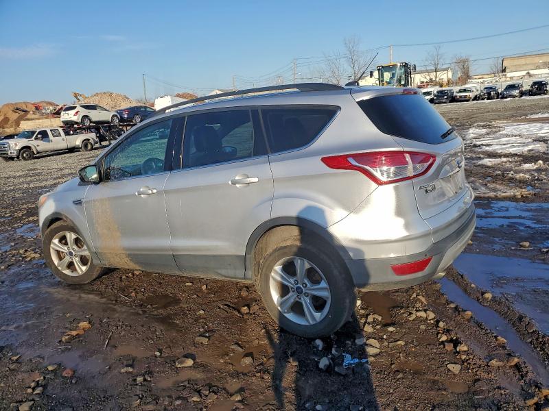 Photo 2 from auction – 2014 FORD ESCAPE SE with VIN 1FMCU9G9XEUE45285