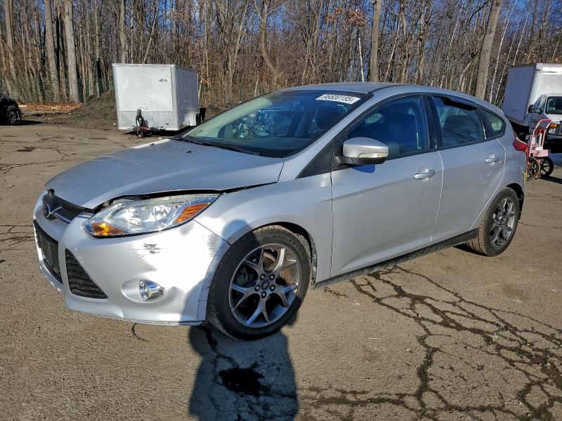 FORD FOCUS SE 2014 with VIN 1FADP3K23EL202033 - Photo from auction