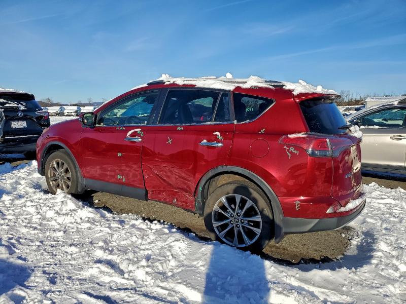 Photo 2 from auction – 2018 TOYOTA RAV4 LIMIT with VIN JTMDFREV1JD237616