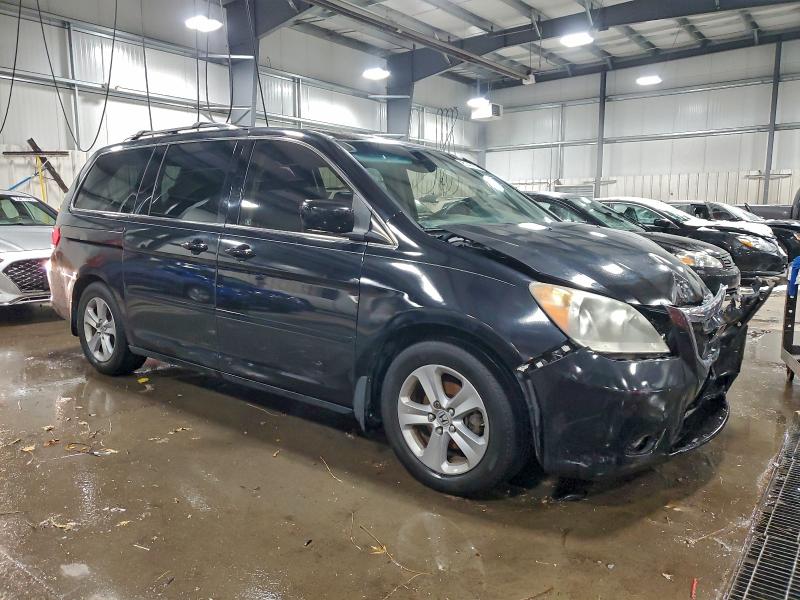 Photo 4 from auction – 2010 HONDA ODYSSEY TO with VIN 5FNRL3H93AB057511