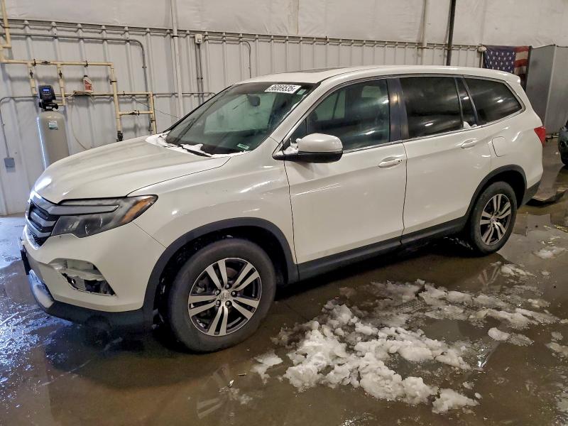 HONDA PILOT EXLN 2016 with VIN 5FNYF6H74GB124161 - Photo from auction