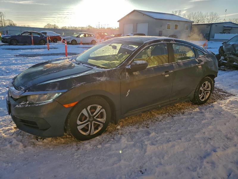 HONDA CIVIC LX 2017 with VIN 19XFC2F51HE032927 - Photo from auction