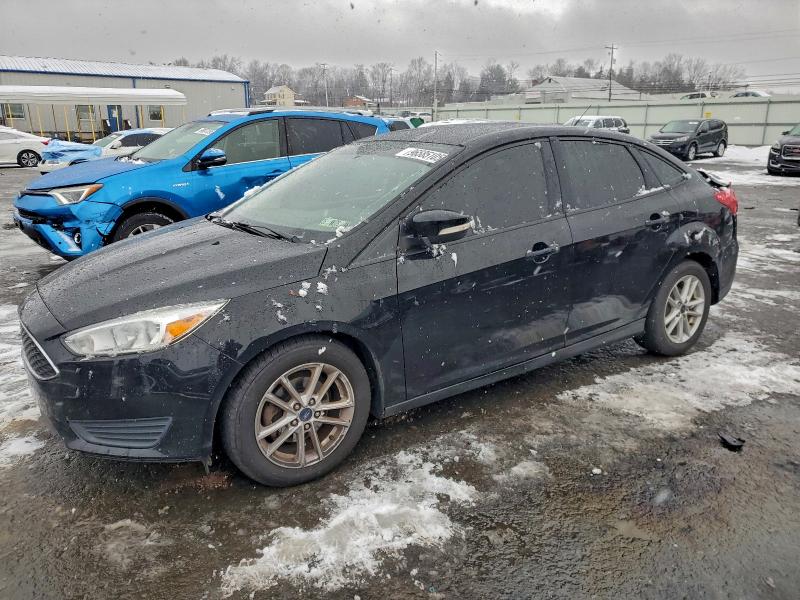 FORD FOCUS SE 2017 с VIN 1FADP3F27HL234157 - Фото с аукциона