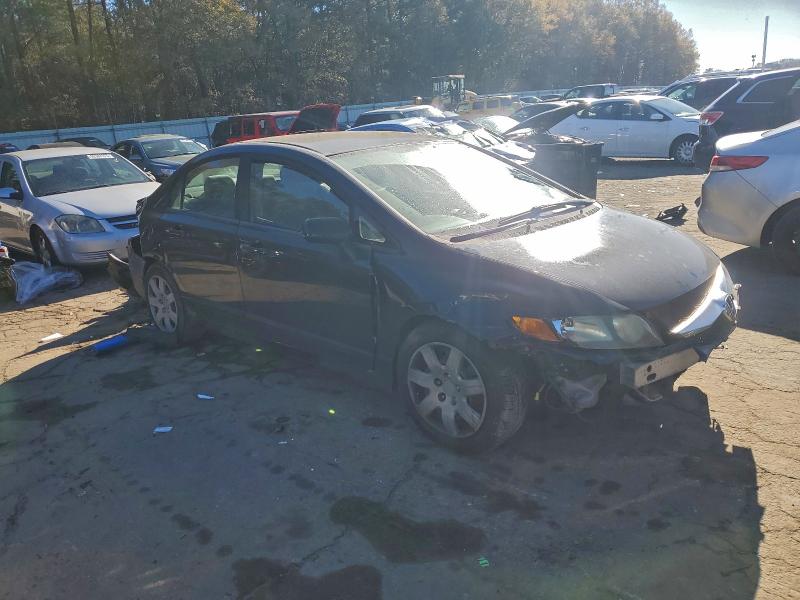 Photo 4 from auction – 2011 HONDA CIVIC LX with VIN 19XFA1F55BE012073