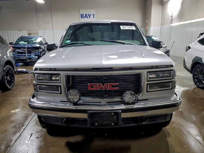 Photo 5 from auction – 1997 GMC SUBURBAN K with VIN 1GKFK16R0VJ738712