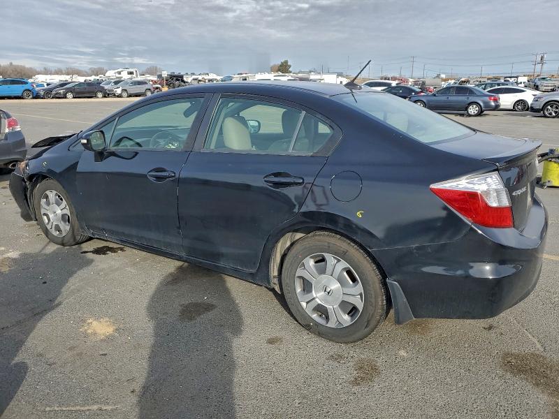 Photo 2 from auction – 2012 HONDA CIVIC HYBR with VIN JHMFB4F31CS004885