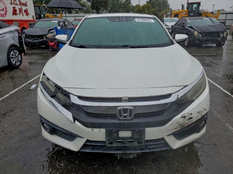 Photo 5 from auction – 2017 HONDA CIVIC TOUR with VIN 2HGFC3B92HH358112