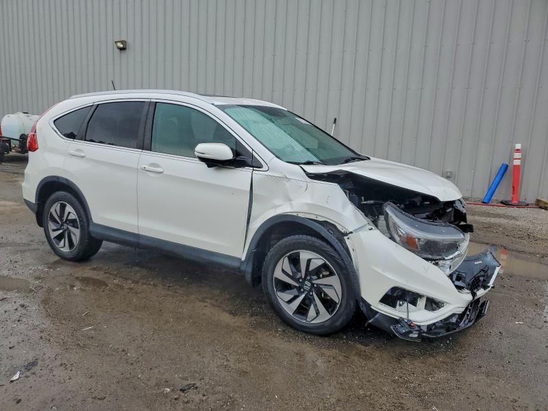 Photo 4 from auction – 2015 HONDA CR-V TOURI with VIN 5J6RM3H97FL023504