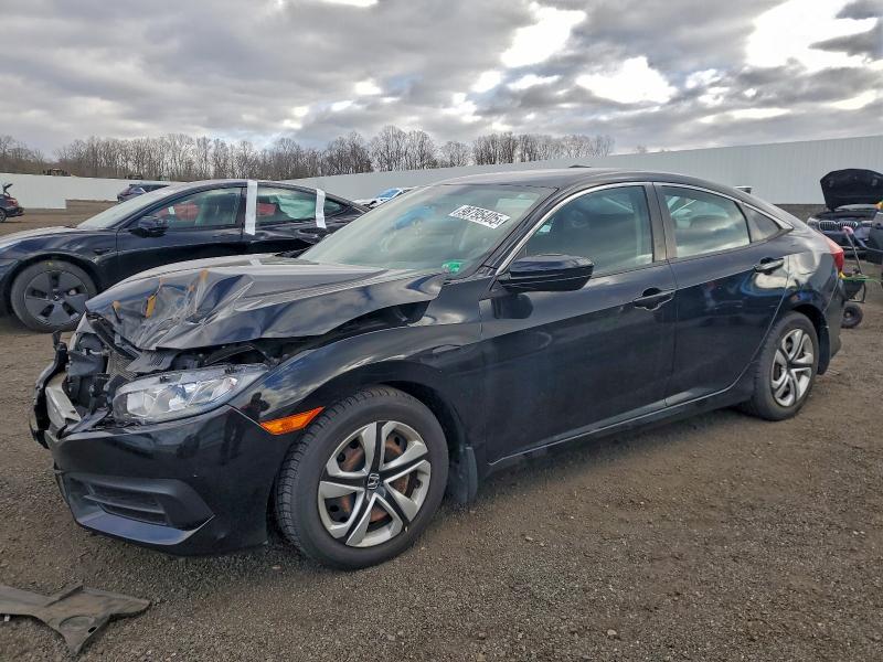 HONDA CIVIC LX 2017 with VIN 19XFC2F57HE208931 - Photo from auction