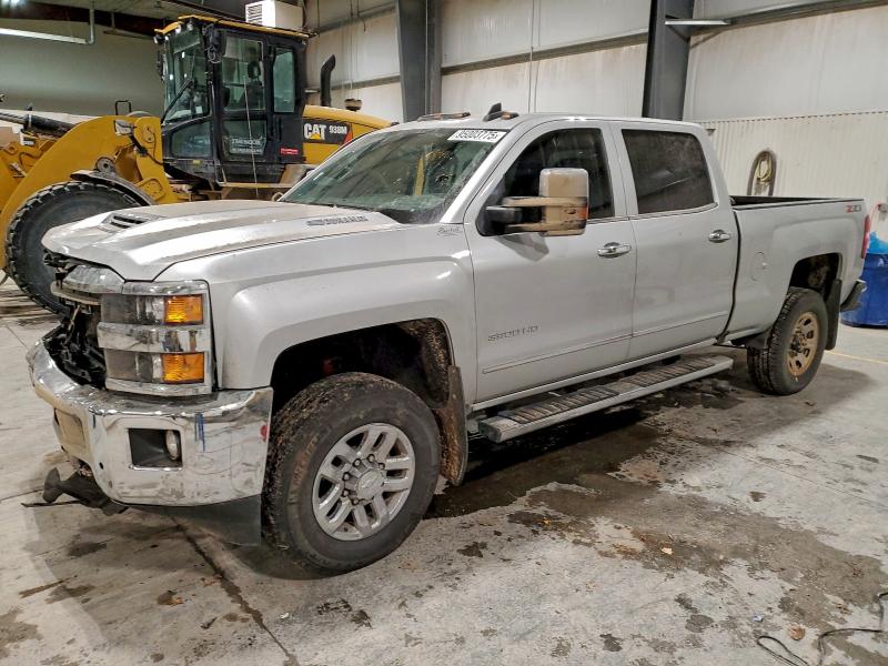 CHEVROLET SILVERADO 2018 with VIN 1GC4K0CY4JF176853 - Photo from auction