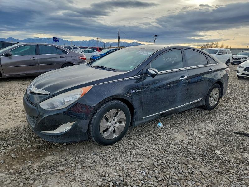 HYUNDAI SONATA HYB 2015 with VIN KMHEC4A49FA123185 - Photo from auction