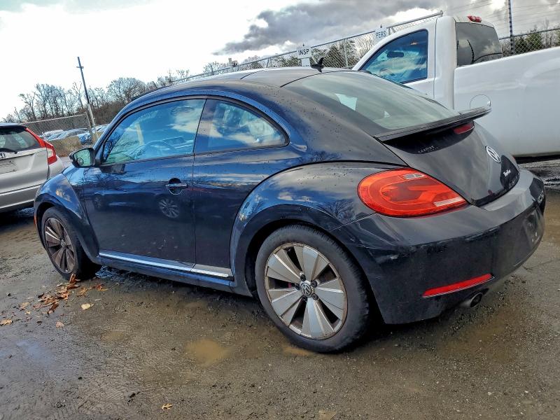Photo 2 from auction – 2012 VOLKSWAGEN BEETLE TUR with VIN 3VW4A7AT2CM633792
