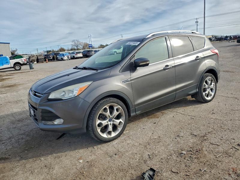 FORD ESCAPE TIT 2014 with VIN 1FMCU0J9XEUB59568 - Photo from auction