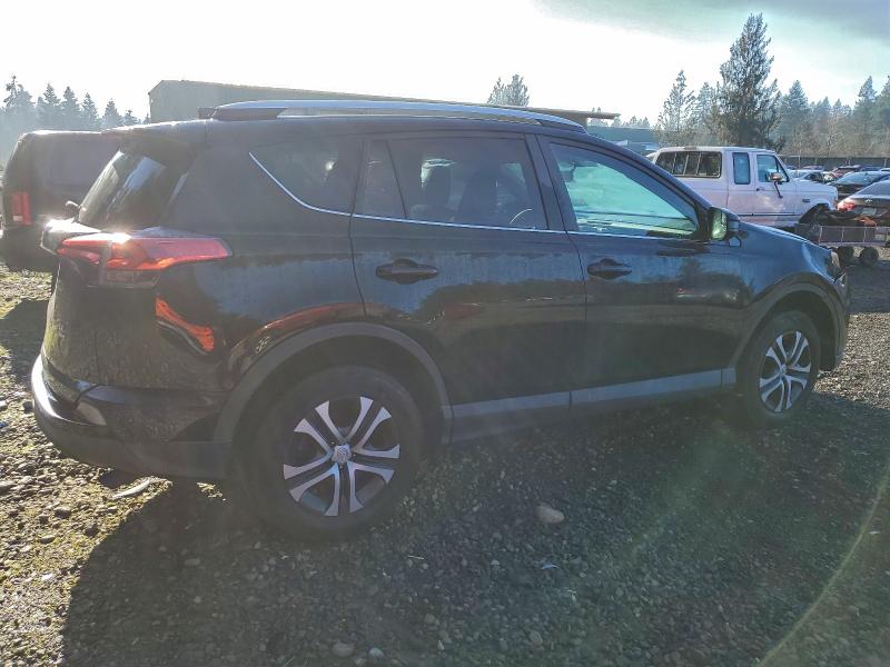Photo 3 from auction – 2016 TOYOTA RAV4 LE with VIN 2T3BFREV8GW472792