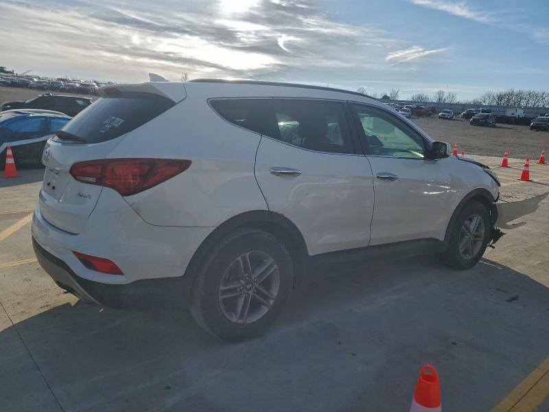 Photo 3 from auction – 2017 HYUNDAI SANTA FE S with VIN 5NMZU3LB9HH006336