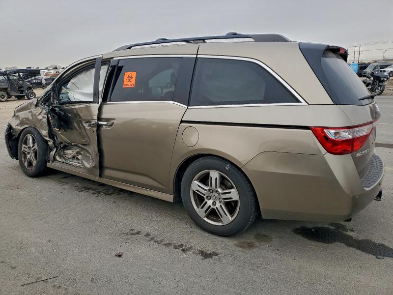 Photo 2 from auction – 2011 HONDA ODYSSEY TO with VIN 5FNRL5H9XBB024938