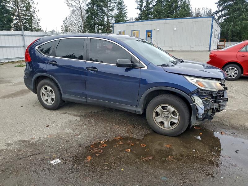 Photo 4 from auction – 2015 HONDA CR-V LX with VIN 5J6RM4H37FL093053