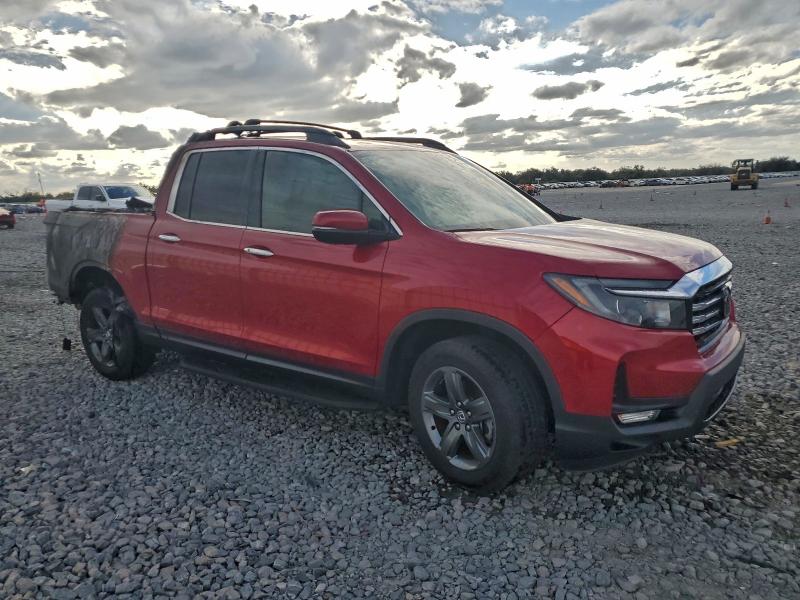 Photo 4 from auction – 2023 HONDA RIDGELINE with VIN 5FPYK3F71PB014690