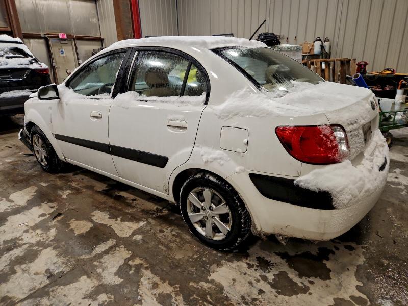 Photo 2 from auction – 2009 KIA RIO BASE with VIN KNADE223996536829